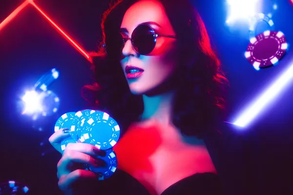 JILI998 Mobile Casino — Play anytime, anywhere A player using their smartphone during a festive local event, representing JILI998’s fully mobile-friendly casino.